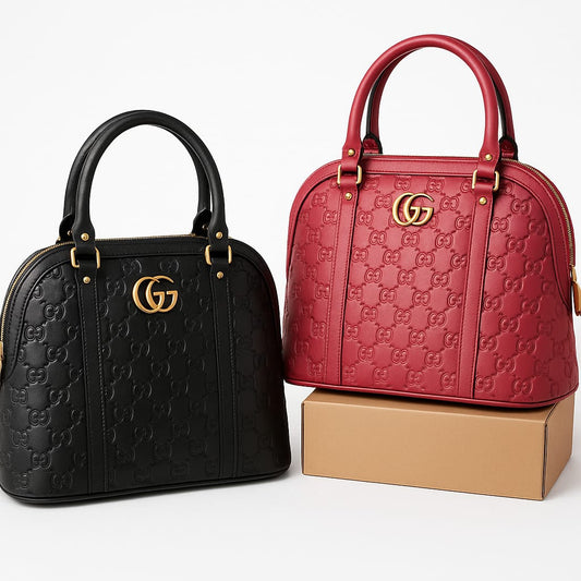 Embossed Monogram Dome Handbag